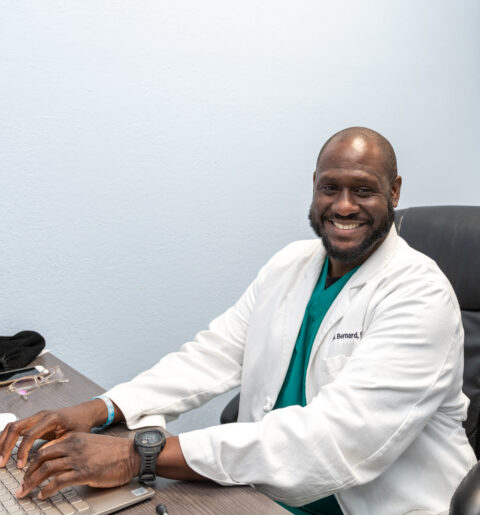A doctor smiling
