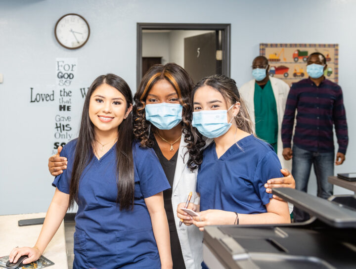 3 clinic staff girls smiling
